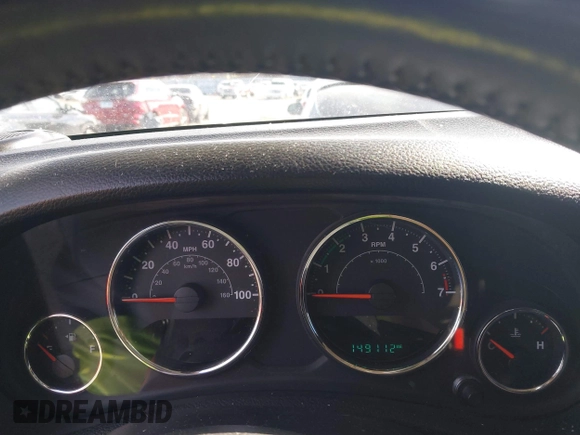 2015 Jeep Wrangler Unlimited Willys Wheeler with VIN 1C4BJWDG4FL589822, listed as a IAAI auction lot 41732614 with 149,112 mi miles and . Bid and sale history available at DreamBid. Image 7.