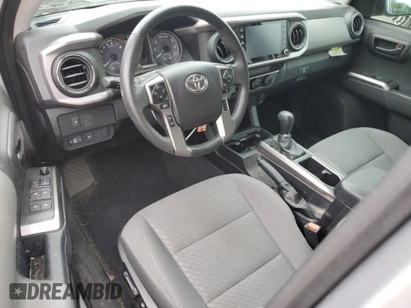 2021 Toyota Tacoma SR5 z VIN 3TYAZ5CN5MT004373, wystawiony jako Copart lot #58526145 z przebiegiem Nie podano mil oraz Szkoda całkowita • Salvage title. Historia ofert i sprzedaży dostępna na DreamBid. Obrazek 8.