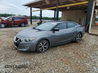 2017 Nissan Maxima SR with VIN 1N4AA6AP5HC394076, listed as a Copart auction lot 60118735 with 114,769 mi miles and Salvage title. Bid and sale history available at DreamBid. Image 1.