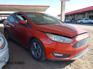 2018 Ford Focus SE z VIN 1FADP3FE6JL241214, wystawiony jako IAAI lot #42508986 z przebiegiem 40 287 mil mil oraz . Historia ofert i sprzedaży dostępna na DreamBid. Obrazek 1.