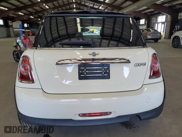 2011 MINI Hardtop with VIN WMWSU3C56BT098018, listed as a Copart auction lot 55075405 with 130,889 mi miles and Clean Title. Bid and sale history available at DreamBid. Image 6.