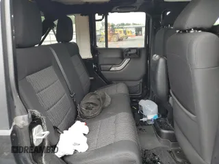 2012 Jeep Wrangler Unlimited Sport z VIN 1C4BJWDG9CL102626, wystawiony jako Copart lot #58421455 z przebiegiem 128 421 mil mil oraz Szkoda całkowita • Salvage title. Historia ofert i sprzedaży dostępna na DreamBid. Obrazek 11.
