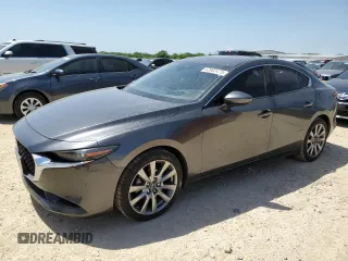 2021 Mazda 3 Premium z VIN JM1BPADL9M1319945, wystawiony jako Copart lot #52902425 z przebiegiem 74 221 mil mil oraz Szkoda całkowita • Salvage title. Historia ofert i sprzedaży dostępna na DreamBid. Obrazek 1.