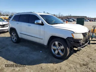 2013 Jeep Grand Cherokee Overland with VIN 1C4RJECT7DC612613, listed as a Copart auction lot 86320744 with 139,111 mi miles and Salvage Title. Bid and sale history available at carsss.com. Image 4.