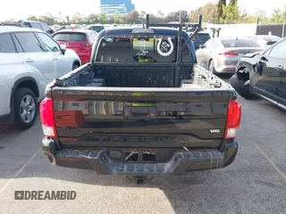 2017 Toyota Tacoma SR5 with VIN 5TFAZ5CN0HX053573, listed as a IAAI auction lot 41797867 with 102,628 mi miles and . Bid and sale history available at DreamBid. Image 17.