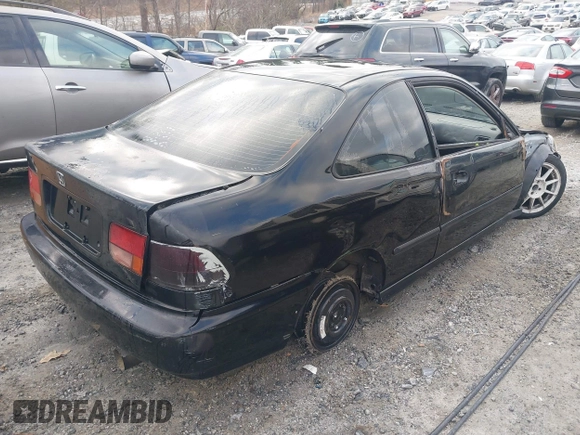 1997 Honda Civic DX with VIN 1HGEJ6125VL095006, listed as a IAAI auction lot 41473812 with 264,966 mi miles. Bid and sale history available at carsss.com. Image 4.