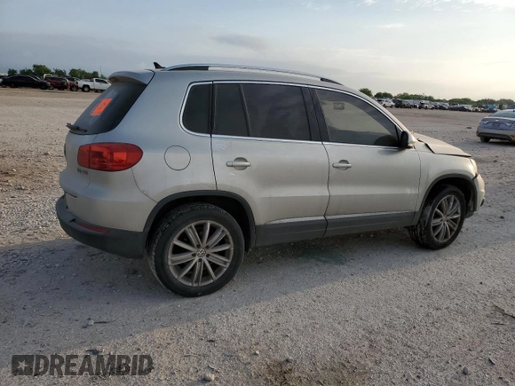 2012 Volkswagen Tiguan SEL with VIN WVGAV7AX2CW529098, listed as a Copart auction lot 53349565 with 128,603 mi miles and Salvage Title. Bid and sale history available at DreamBid. Image 3.