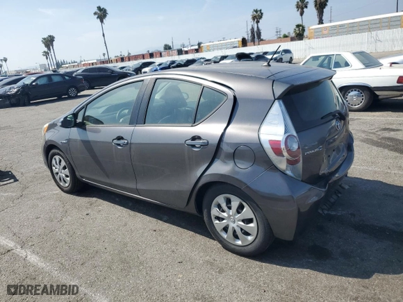 2014 Toyota Prius c One with VIN JTDKDTB34E1573233, listed as a Copart auction lot 54385895 with 107,094 mi miles and Clean Title. Bid and sale history available at carsss.com. Image 2.