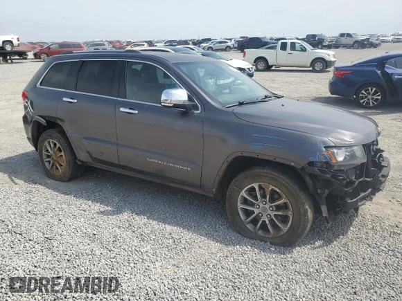 2014 Jeep Grand Cherokee Limited with VIN 1C4RJFBG5EC451741, listed as a Copart auction lot 56536195 with 172,582 mi miles and Salvage title. Bid and sale history available at DreamBid. Image 4.