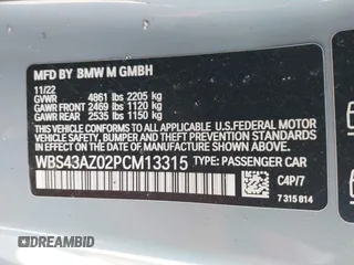2023 BMW M4 Competition xDrive with VIN WBS43AZ02PCM13315, listed as a IAAI auction lot 41596968 with 28,967 mi miles. Bid and sale history available at carsss.com. Image 9.