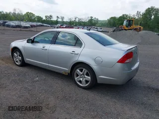 2011 Mercury Milan z VIN 3MEHM0HA5BR602401, wystawiony jako IAAI lot #42287369 z przebiegiem 100 139 mil mil oraz . Historia ofert i sprzedaży dostępna na DreamBid. Obrazek 3.