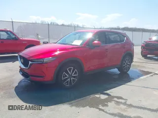2018 Mazda CX-5 Grand Touring with VIN JM3KFBDM6J0424663, listed as a IAAI auction lot 42003207 with 95,442 mi miles and . Bid and sale history available at DreamBid. Image 17.