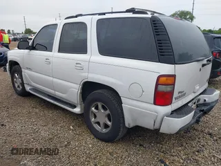 2002 GMC Yukon Denali z VIN 1GKEK63U62J248966, wystawiony jako IAAI lot #42366016 z przebiegiem 190 804 mil mil oraz . Historia ofert i sprzedaży dostępna na DreamBid. Obrazek 3.