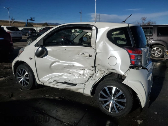 2014 Scion iQ with VIN JTNJJXB01EJ026837, listed as a Copart auction lot 43596385 with 52,826 mi miles and Salvage title. Bid and sale history available at DreamBid. Image 2.
