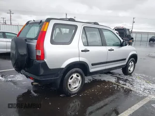 2004 Honda CR-V LX with VIN JHLRD78484C007197, listed as a IAAI auction lot 41581380 with 230,537 mi miles and . Bid and sale history available at carsss.com. Image 4.