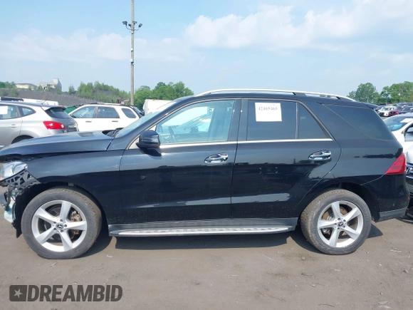 2018 Mercedes-Benz GLE 350 with VIN 4JGDA5HB9JB030035, listed as a IAAI auction lot 42405465 with 84,556 mi miles and . Bid and sale history available at DreamBid. Image 14.