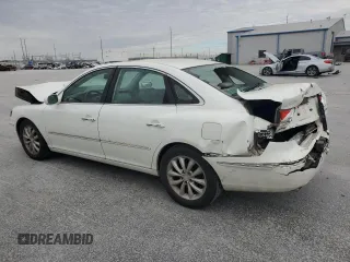2006 Hyundai Azera SE z VIN KMHFC46F26A046383, wystawiony jako Copart lot #47971535 z przebiegiem 306 323 mil mil oraz Szkoda całkowita • Salvage title. Historia ofert i sprzedaży dostępna na DreamBid. Obrazek 2.