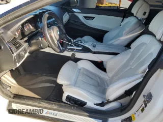 2015 BMW M6 z VIN WBSLX9C51FD160757, wystawiony jako Copart lot #51991315 z przebiegiem 71 133 mil mil oraz Szkody całkowita. Historia ofert i sprzedaży dostępna na DreamBid. Obrazek 7.