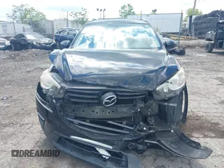 2016 Mazda CX-5 Sport with VIN JM3KE4BY2G0796577, listed as a IAAI auction lot 42230645 with 103,223 mi miles and . Bid and sale history available at DreamBid. Image 11.