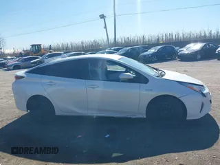 2017 Toyota Prius Two z VIN JTDKARFU4H3053749, wystawiony jako IAAI lot #41816036 z przebiegiem 151 594 mil mil oraz . Historia ofert i sprzedaży dostępna na DreamBid. Obrazek 13.