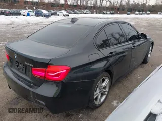 2018 BMW 3 Series 330i xDrive with VIN WBA8D9C59JA012658, listed as a IAAI auction lot 41523677 with 117,049 mi miles and . Bid and sale history available at DreamBid. Image 4.