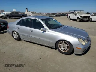 2003 Mercedes-Benz E-Class 3.2L with VIN WDBUF65JX3A096821, listed as a Copart auction lot 74378684 with 157,088 mi miles and Clean Title. Bid and sale history available at carsss.com. Image 4.
