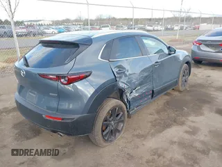 2023 Mazda CX-30 S Carbon Edition with VIN 3MVDMBCM1PM573317, listed as a IAAI auction lot 41785371 with 6,475 mi miles and . Bid and sale history available at DreamBid. Image 4.