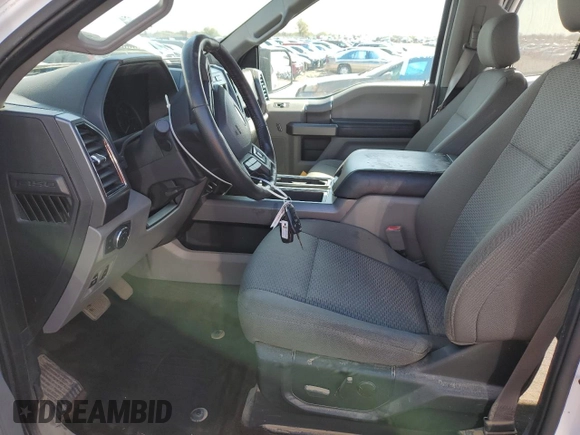 2019 Ford F-150 XL with VIN 1FTEW1E57KKE02961, listed as a Copart auction lot 52257105 with 117,296 mi miles and Salvage Title. Bid and sale history available at carsss.com. Image 7.
