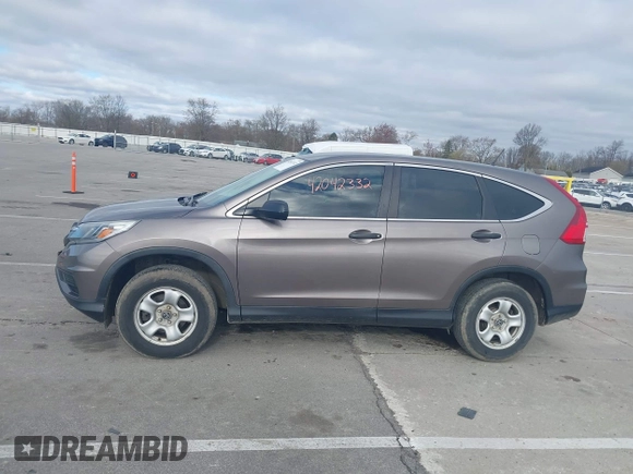 2015 Honda CR-V LX with VIN 5J6RM4H35FL127992, listed as a IAAI auction lot 42042332 with 141,642 mi miles and . Bid and sale history available at DreamBid. Image 14.