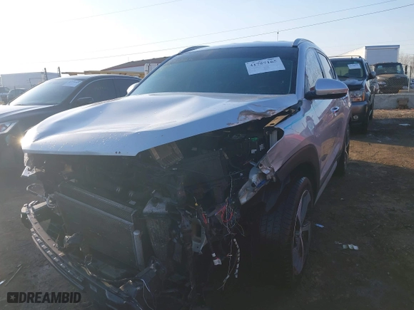 2018 Hyundai Tucson Value with VIN KM8J3CA23JU651464, listed as a IAAI auction lot 41757165 with 72,339 mi miles. Bid and sale history available at carsss.com. Image 18.
