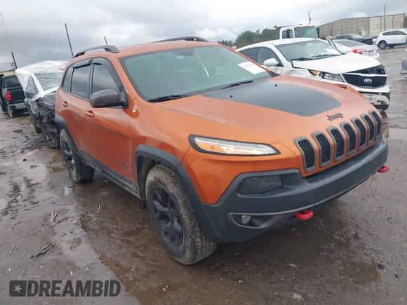 2016 Jeep Cherokee Trailhawk z VIN 1C4PJMBS0GW155379, wystawiony jako IAAI lot #41472352 z przebiegiem 116 036 mil mil oraz . Historia ofert i sprzedaży dostępna na DreamBid. Obrazek 1.