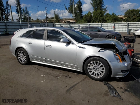 2013 Cadillac CTS Wagon Luxury with VIN 1G6DE8E51D0101658, listed as a Copart auction lot 44443065 with 135,727 mi miles and Salvage Title. Bid and sale history available at carsss.com. Image 4.