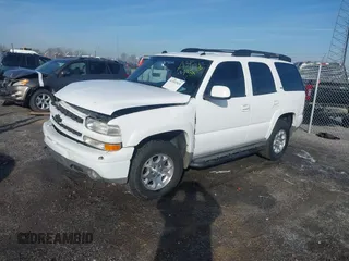 2005 Chevrolet Tahoe Z71 z VIN 1GNEK13T55R268077, wystawiony jako IAAI lot #41442024 z przebiegiem 205 176 mil mil oraz . Historia ofert i sprzedaży dostępna na DreamBid. Obrazek 20.