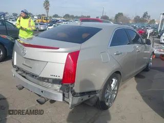 2013 Cadillac ATS with VIN 1G6AA5RX0D0156806, listed as a IAAI auction lot 41462134 with 138,323 mi miles and . Bid and sale history available at DreamBid. Image 4.