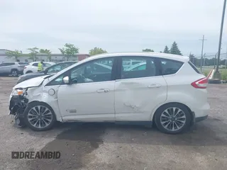 2017 Ford C-Max Titanium z VIN 1FADP5FU1HL100046, wystawiony jako IAAI lot #42356813 z przebiegiem 57 737 mil mil oraz . Historia ofert i sprzedaży dostępna na DreamBid. Obrazek 14.