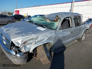 2004 Dodge Dakota SLT with VIN 1D7HG48N24S699380, listed as a IAAI auction lot 41436819 with 1 mi miles. Bid and sale history available at carsss.com. Image 6.