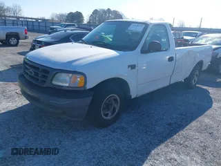 2003 Ford F-150 XL with VIN 1FTRF17W13NB65293, listed as a IAAI auction lot 41264978 with Not Provided miles and . Bid and sale history available at DreamBid. Image 2.