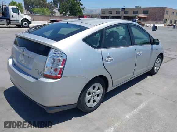 2008 Toyota Prius z VIN JTDKB20U183378002, wystawiony jako IAAI lot #42408794 z przebiegiem 227 839 mil mil oraz . Historia ofert i sprzedaży dostępna na DreamBid. Obrazek 4.