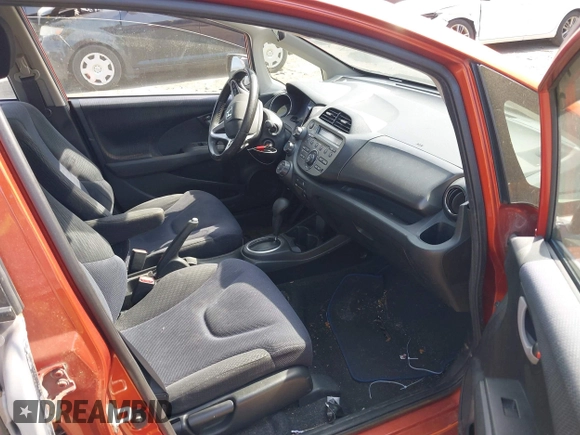 2012 Honda Fit Sport with VIN JHMGE8H55CC006277, listed as a IAAI auction lot 42210793 with 217,068 mi miles and . Bid and sale history available at DreamBid. Image 5.