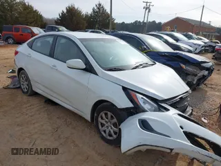 2013 Hyundai Accent GLS with VIN KMHCT4AEXDU346427, listed as a IAAI auction lot 41407399 with 202,696 mi miles. Bid and sale history available at carsss.com. Image 1.
