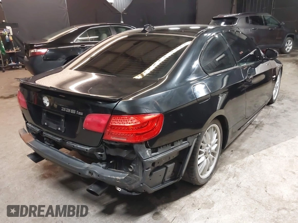 2011 BMW 3 Series 335is with VIN WBAKG1C51BE618450, listed as a IAAI auction lot 41555179 with 100,942 mi miles and . Bid and sale history available at carsss.com. Image 4.