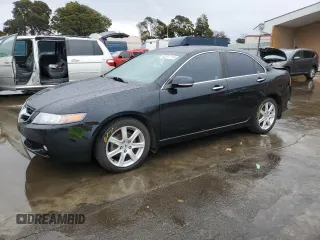 2004 Acura TSX w/Navigation with VIN JH4CL95914C000446, listed as a Copart auction lot 82317114 with 181,009 mi miles and Salvage title. Bid and sale history available at DreamBid. Image 1.