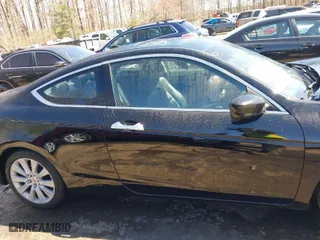 2009 Honda Accord Cpe EX-L with VIN 1HGCS22859A002020, listed as a IAAI auction lot 41819103 with 131,089 mi miles. Bid and sale history available at carsss.com. Image 13.