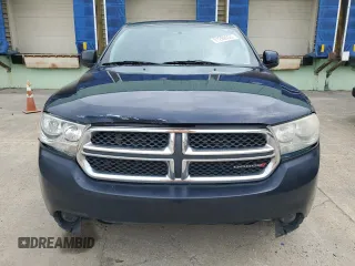 2012 Dodge Durango SXT z VIN 1C4RDJAG5CC322147, wystawiony jako Copart lot #61288635 z przebiegiem 297 224 mil mil oraz Czysty tytuł • Clean title. Historia ofert i sprzedaży dostępna na DreamBid. Obrazek 5.
