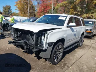 2018 GMC Yukon Denali with VIN 1GKS1CKJ2JR397760, listed as a IAAI auction lot 40653383 with 110,841 mi miles. Bid and sale history available at carsss.com. Image 2.