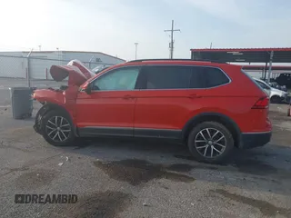 2018 Volkswagen Tiguan SEL z VIN 3VV3B7AX1JM208075, wystawiony jako IAAI lot #42651678 z przebiegiem Nie podano mil oraz . Historia ofert i sprzedaży dostępna na DreamBid. Obrazek 13.