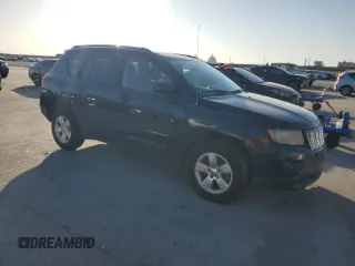 2014 Jeep Compass Sport with VIN 1C4NJCBA5ED749869, listed as a Copart auction lot 52779135 with 166,962 mi miles and Salvage Title. Bid and sale history available at carsss.com. Image 4.