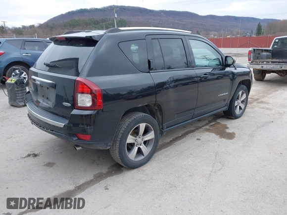 2016 Jeep Compass Latitude with VIN 1C4NJDEB8GD695268, listed as a IAAI auction lot 41724921 with 137,118 mi miles. Bid and sale history available at carsss.com. Image 4.