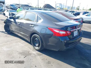 2016 Nissan Altima SR with VIN 1N4AL3AP5GC282773, listed as a IAAI auction lot 42386733 with 134,584 mi miles and . Bid and sale history available at DreamBid. Image 3.