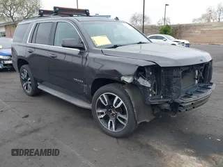 2015 Chevrolet Tahoe LT with VIN 1GNSCBKC1FR233898, listed as a IAAI auction lot 42004048 with 115,779 mi miles and . Bid and sale history available at DreamBid. Image 1.
